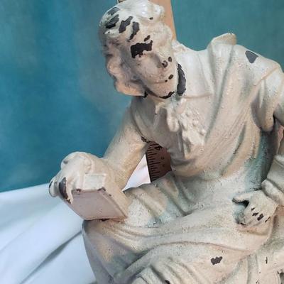 Cast iron man with books Lyre