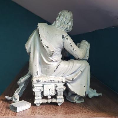 Cast iron man with books Lyre