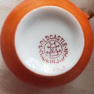 11 Orange Espresso cups, saucers and Sugar Bowl