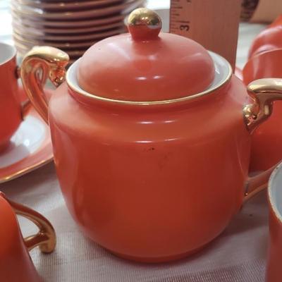 11 Orange Espresso cups, saucers and Sugar Bowl