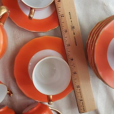 11 Orange Espresso cups, saucers and Sugar Bowl