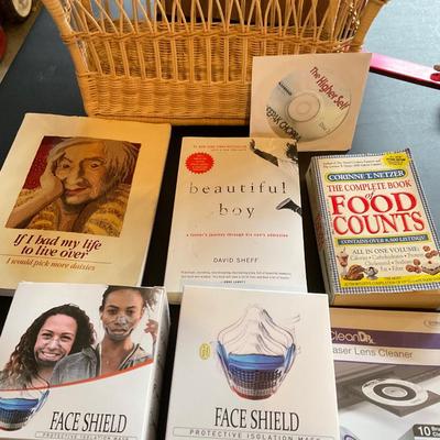 Miscellaneous basket/masks and books