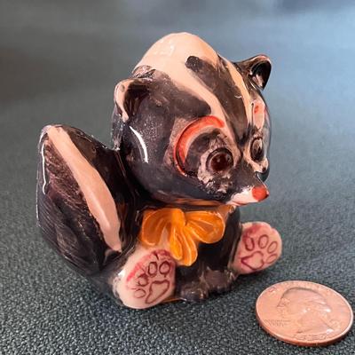 CUTE 2-3/4â€ CERAMIC SKUNK FIGURE