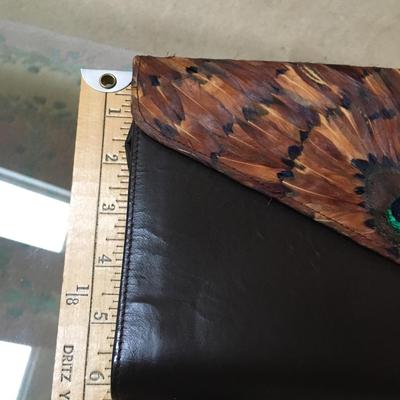 Vintage leather clutch with peacock feathers
