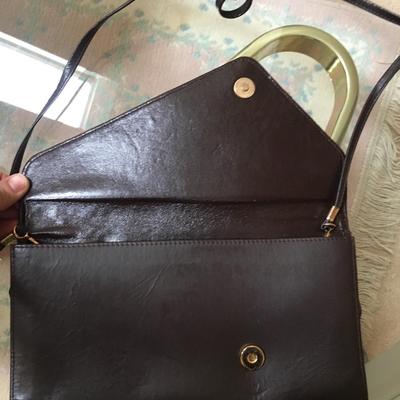 Vintage leather clutch with peacock feathers