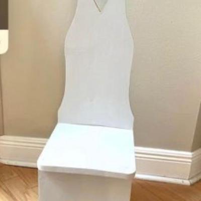 Child’s vintage high-back chair solid wood refinished in  soft gray. 34” high from top of chair to floor. Seat to floor is 12”. Seat is...