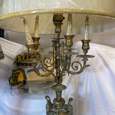 Lot 132 - Pair of brass lamps