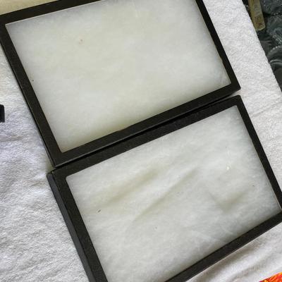 Glass Topped cotton filled display trays.
