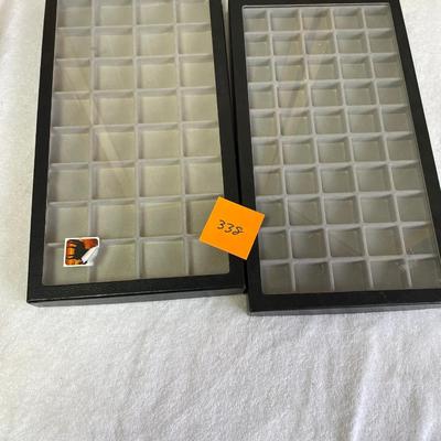 Two covered trinket displays