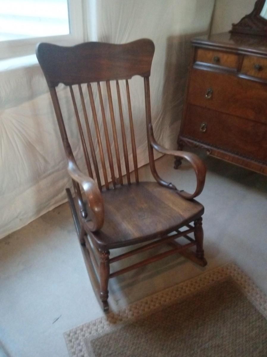 ANTIQUE ROCKING CHAIR, THROW AND THROW RUG