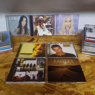 MUSIC ON CD CHER-EAGLES-ELTON JOHN-RICKY MARTIN AND OTHERS