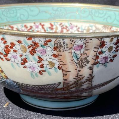 Set of 2 asian theme painted bowls.