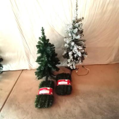 TWO 4' CHRISTMAS TREES AND TWO NEW 50' SOFT GARLAND