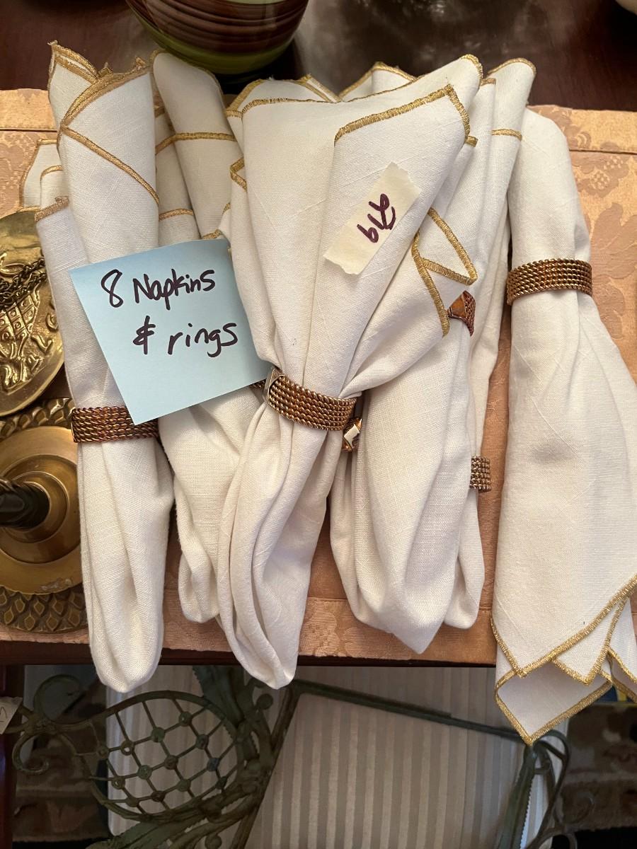 Set of 8 Napkins and Napkin Rings - Lot 219 | EstateSales.org