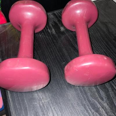 Two Dumbbells approximately 7 lbs each.