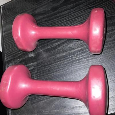 Two Dumbbells approximately 7 lbs each.