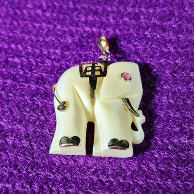Gold Overlay Decor Bone Elephant Pendant