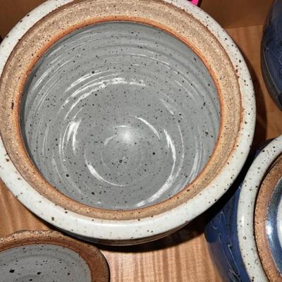 Four Pottery Stoneware Containers with lids.  Signed