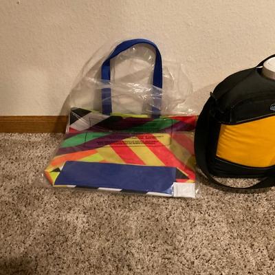 Water jug and shopping bag.