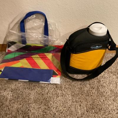 Water jug and shopping bag.