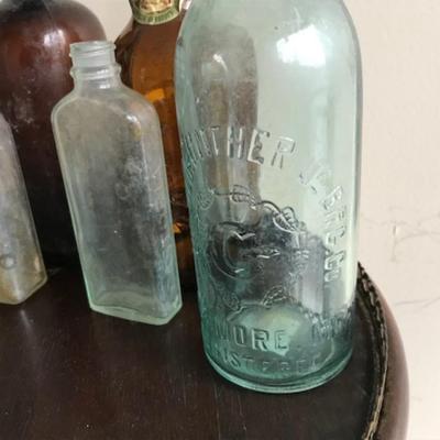 Lot of 12bvintage bottles