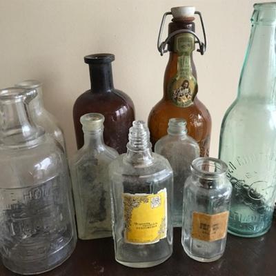 Lot of 12bvintage bottles