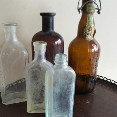 Lot of 12bvintage bottles