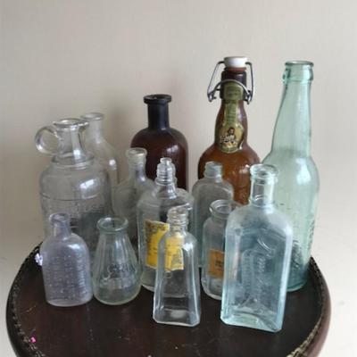 Lot of 12bvintage bottles