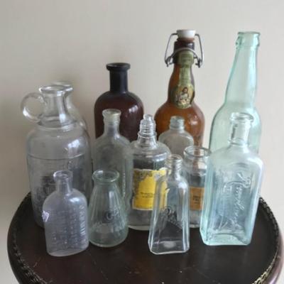 Lot of 12bvintage bottles