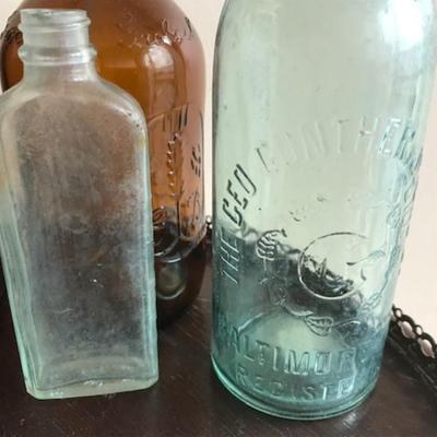 Lot of 12bvintage bottles