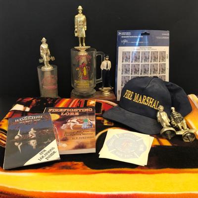 LOT 43M: Loca Firefighter Collection: Throw Blanket, Fire Marshal Hat, Trophy Toppers, 9/11 Stamps , decals, Books & Local Mugs