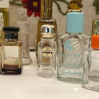 LOT 50M: Vintage Givenchy and more Glass Perfume Bottles,Rosetti Leather Wallet, Silvertone Mirror Vanity tray , a Signed 