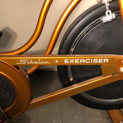LOT 232M: Orange Schwinn Stationary Exercise Bike