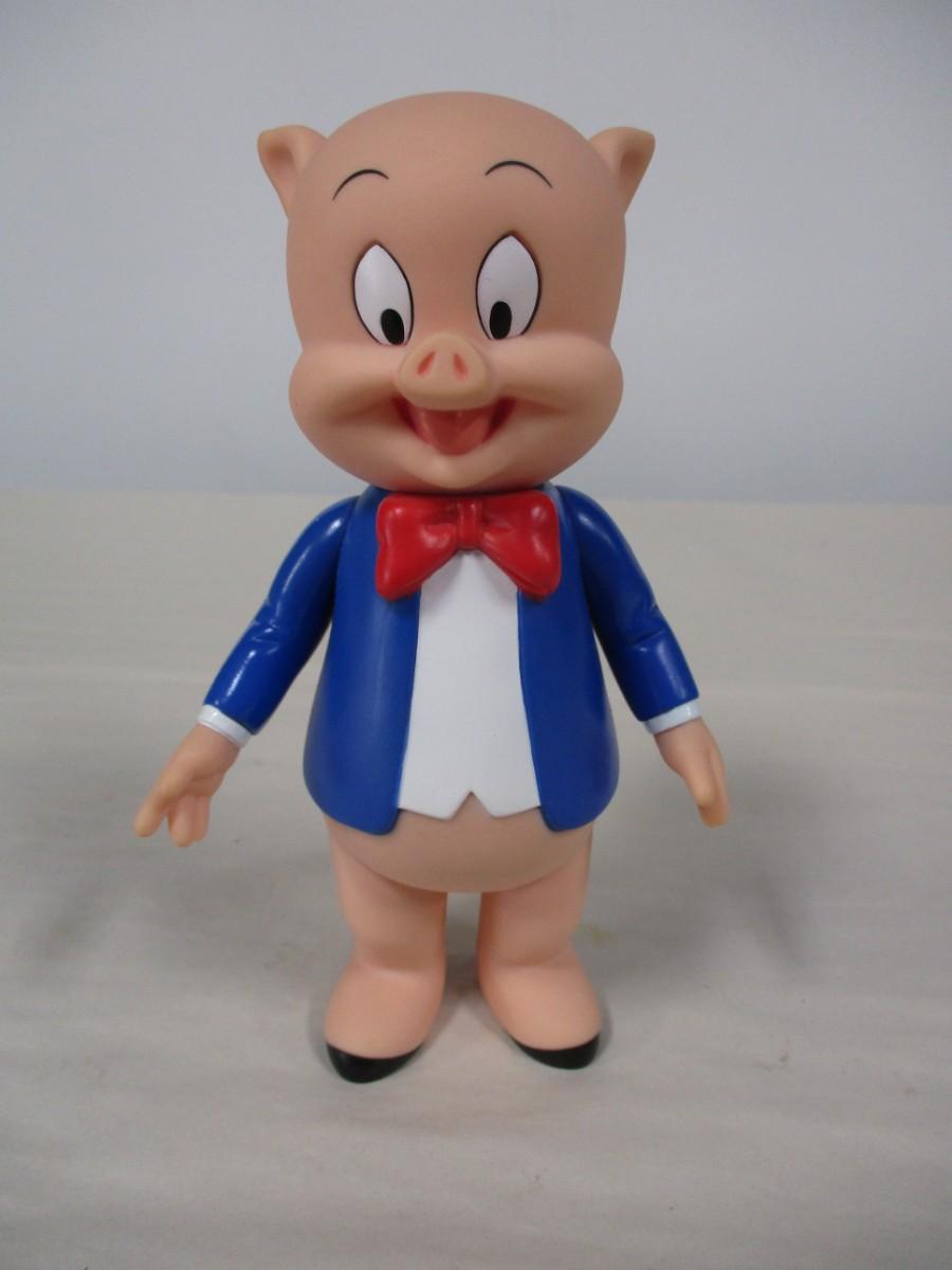 Plastic Porky Pig & Piggy Bank | EstateSales.org