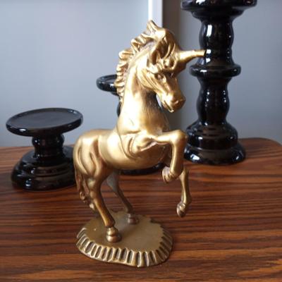 BRASS UNICORN AND THREE PILLER CANDLE HOLDERS