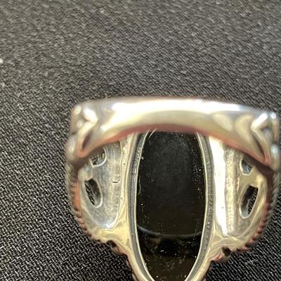 STERLING SILVER RING WITH DIAMOND CUT BLACK STONE