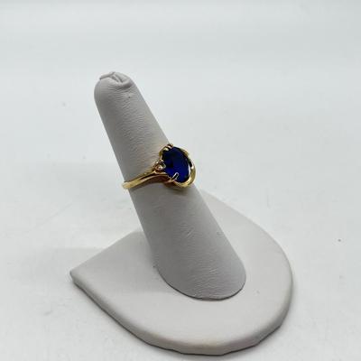 LOT 125: 14K Gold London Blue Topaz + Small Diamond Size 6 Ring - 3.1 gtw