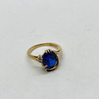 LOT 125: 14K Gold London Blue Topaz + Small Diamond Size 6 Ring - 3.1 gtw
