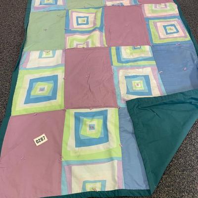 Machine quilted lap quilt