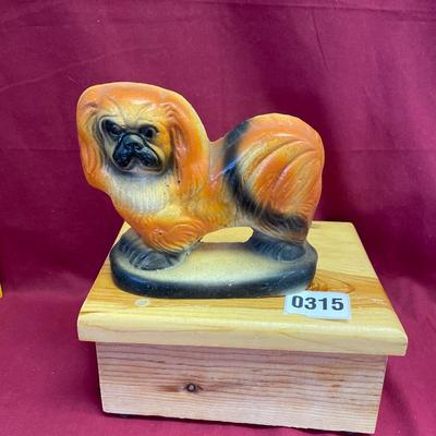 Pekingese shelf sitter