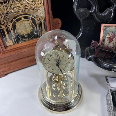 4 Vintage clocks and figurines