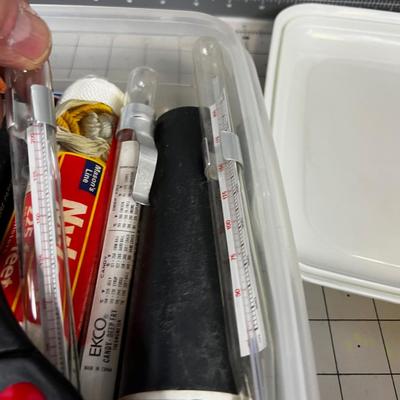 Drawer Cleanout tub; Flashlight, Candle, Thermometer