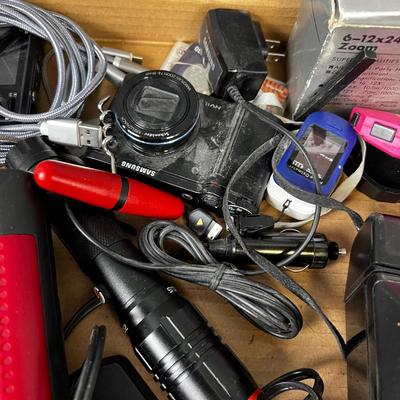 Tray full of Camera, Stop Watch, Cables etc. 