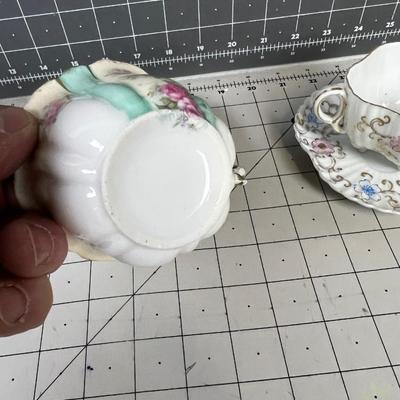 2 DAINTY TEA CUPS White with pink floral 