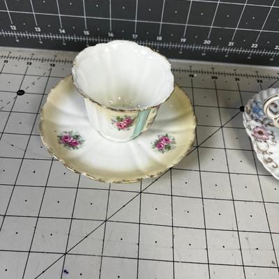 2 DAINTY TEA CUPS White with pink floral 