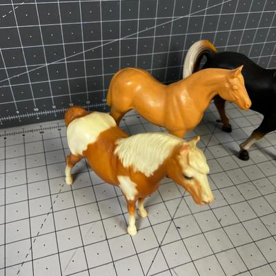 3 Plastic Horses 