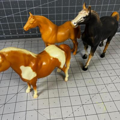 3 Plastic Horses 