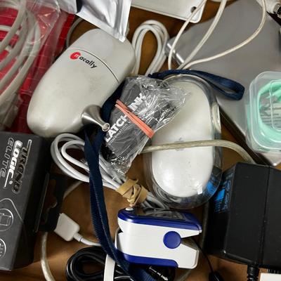 Tray of Electronics; Oximeter, Cables Computer Mouse Watch.