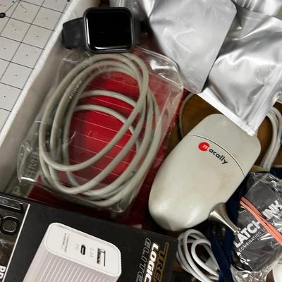 Tray of Electronics; Oximeter, Cables Computer Mouse Watch.