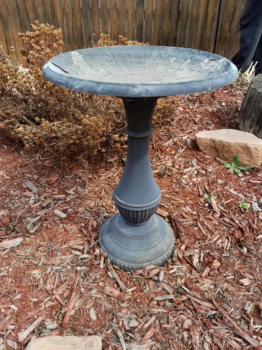Metal bird bath